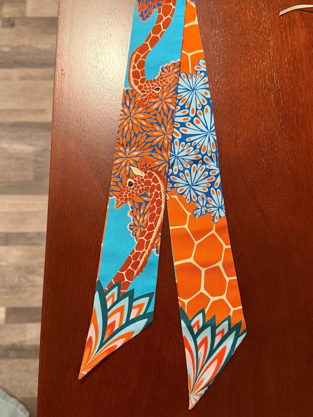 Orange and Turquoise Giraffe Pattern Silk Scarf Tie. One small spot on back side
